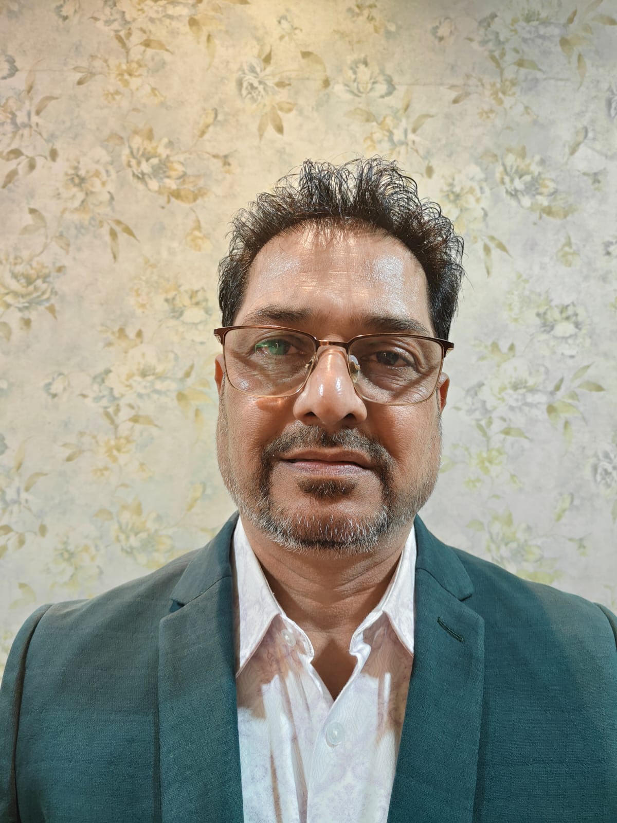 Dr. Girish Manohar Malu